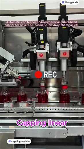 Automatic cap feeding system and tracking type dual-head capping machine for honey, oil, beverage, sauce, milk, daily chemical, etc. #cappingmachine #capfeeder #labelingmachine #fillingmachine #packagingequipmentmanufacfurer #sealingmachine #fyp #hengyundafttr