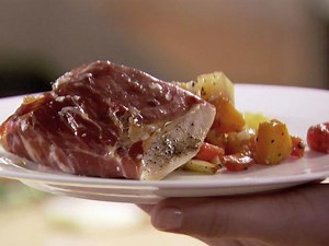 Prosciutto Roasted Bass with Autumn Vegetables