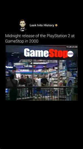 Look Into History on Instagram: "The midnight release of the PlayStation 2 in 2000 was a core memory for early-2000s gamers. Crowds packed outside stores, the excitement was electric, and everyone was counting down to grab the console that felt like the future. People were cheering, comparing memory cards, and debating which game they'd fire up first. Pure pre-digital hype. 🎮✨ If you grew up with a PS2, Xbox, or GameCube, moments like this hit different. Late-night launches, wired contro