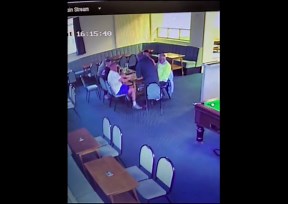 Mischievous prankster moves chair at the last second, sending man tumbling down