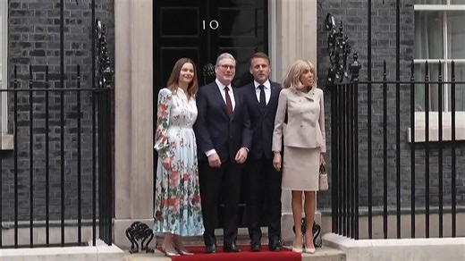 French President Emmanuel Macron arrives at 10 Downing Street