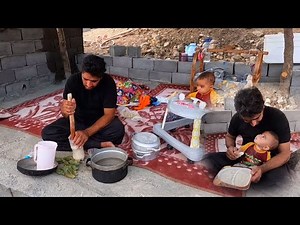 Documentary about the life of a nomadic father and baby, cooking rice porridge for Arad