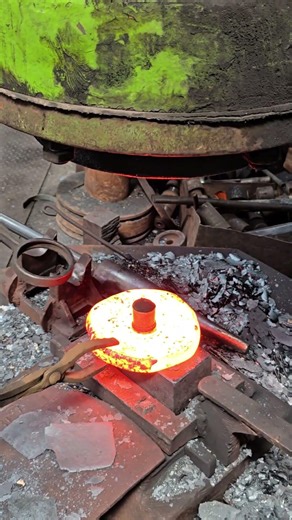 Inside the forging factory The process of forging a square steel billet into a round shape #process