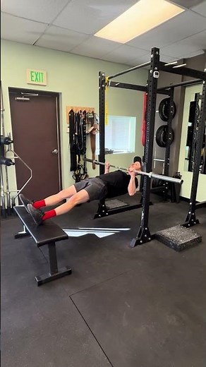 Feet elevated barbell inverted row