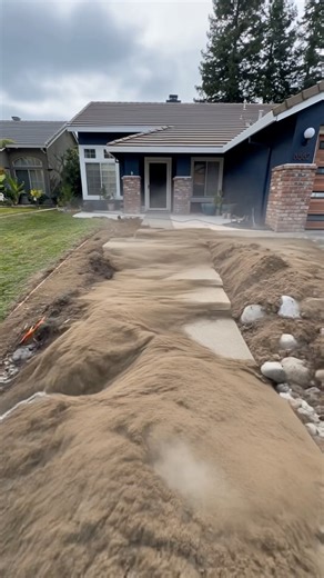 Now, this is what I call some self leveling concrete! Check out this front yard remodel