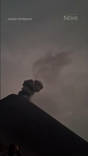 The moment lightning strike hits erupting volcano