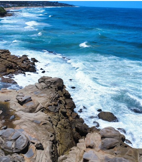 Stunning Beach Day Drone Video Over Ocean Waves