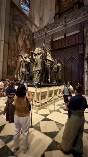 Seville Cathedral feels like stepping into another century — its vast gothic arches and golden light wrapping around you like a living masterpiece. Once a grand mosque, it now stands as one of the largest cathedrals in the world, where every corner carries the weight of history and devotion. Standing beneath its towering ceilings, you can almost hear the echoes of centuries past blending with the hum of the city outside. #SevilleCathedral #Andalusia #SpanishHeritage #TimelessPlaces #WanderWithWo