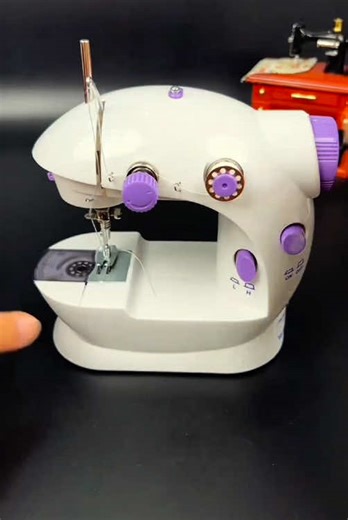 Small machine, big repairs! 🌟 Handheld electric stitcher for buttons, hems & tears. Perfect for home, travel & emergencies. #handheldsewing #sewinggadget #quickrepair #tiktokmademebuyit #fyp