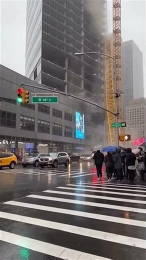 Construction Crane Collapses at Busy City Intersection