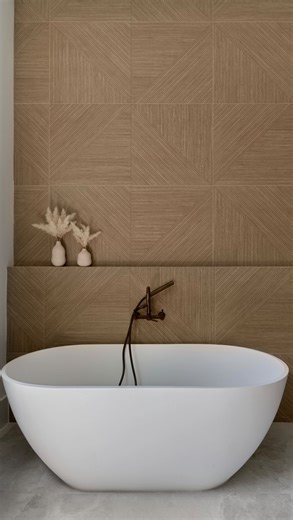 BuildTX Solutions on Instagram: "Would you use porcelain tile in your home? 🙋🏻‍♀️✨ We’re big fans! Why? 👉🏻 It’s super practical, budget-friendly, and comes in endless patterns and finishes that can instantly give a space a high-end look — without the high price tag. 🔝 Perfect for countertops, backsplashes, bathrooms, fireplaces, and so much more. Durable, timeless, and made for real life. 🤍"