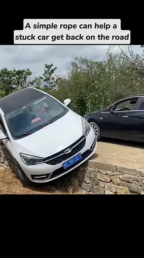 A simple rope can help a stuck car get back on the road #fyp #foryou #foryourpage #vehicle #car #cars