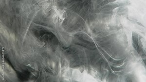 Glitter mist. Smoke texture. Magic spell. Silver gray fog cloud flow dust particles floating motion abstract art background.