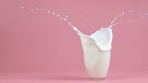 Glass Milk Splash On Color Background Stock Footage Video (100% Royalty-free) 1068448628 | Shutterstock