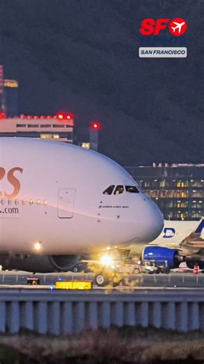 Night Glow 🇦🇪 Emirates Airbus A380 Taxiing Under the Lights at SFO ✈️✨ -- #sfflights #emirates #airbusa380 #superjumbo #planespotting #sfoairport #eveningops #avgeek #aviation #flysfo #fblifestyle | SF Flights