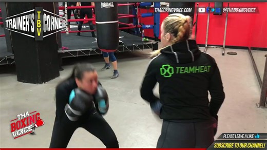 Heather Hardy teaching 'The Heat' to female boxer in training
