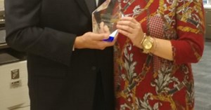 Jessica Sayer receives First Mid Bank & Trust Chairman's Award for Excellence