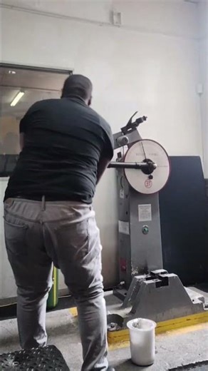 HOW TO SWING AND DROP HEAVY MANUAL HAMMER IN METALLURGICAL TESTING LABORATORY AT LOW TEMPERATURE