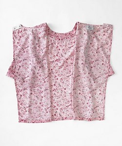 Wow everyone with this open back adaptive top! Beautiful prints and...