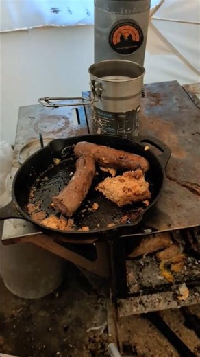 Bannock and homemade sausage in the camp hot tent 🐕🐕🐈🩵
