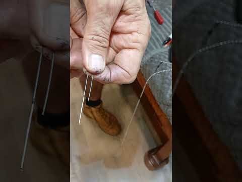 Piano wire string preparation for string replacement.