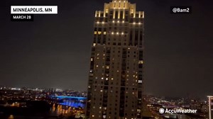 Hail pours down as storms strike the Upper Midwest