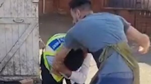 Shocking moment traffic wardens are brutally attacked by thugs