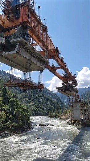 How Engineers Build a Massive Bridge Over a Wild River 🌉