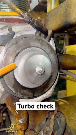 After a proper cleaning of the turbocharger compressor wheel, a smooth spin test confirms.