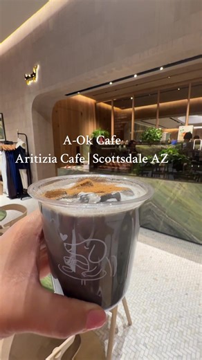 @Aritzia popular brand from Vancouver 🇨🇦 Opened in Scottsdale Fashion Square. Browse their latest elevated basics and athleisure clothes! Must visit their new A-OK CAFE. They have a caffeine free menu. They carry JL Patisserie 🥐 pastries, frozen treats 🍦and smoothies. My iced sesame 🖤 milk was a nice treat $7 Pro-tip- (Need some extra caffiene get a free tasting At Nespresso) 📍7014 E Camelback Rd , Scottsdale, AZ 85251 #aokcafe #aritzia #scottsdaleaz#cafe #fyp