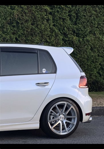 Exploring the Volkswagen Golf GTI in White