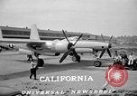 HD Stock Video Footage - Hughes XF-11 military aircraft flying over California, in various configurations, landing gear extended and retracted.