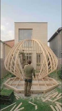 Watch this backyard completely transform into a unique shell-shaped outdoor bar build.