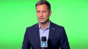 Download A reporter with microphone backdrop green screen. for free