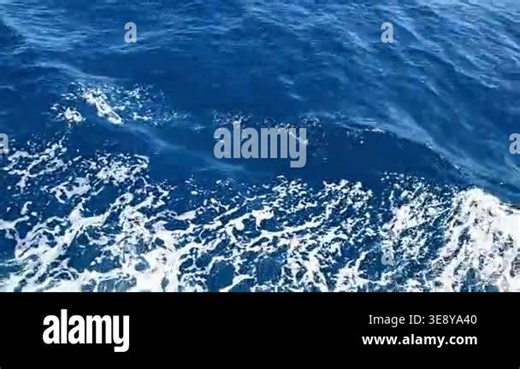 Dynamic ocean waves crashing into white foam in continuous sequence