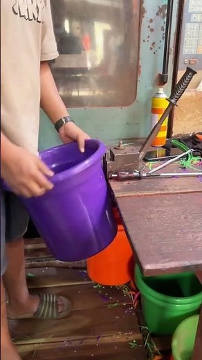 See how plastic buckets are made in a factory