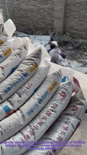 Fertilizer Handling: Worker Moving Sacks with a Wheelbarrow