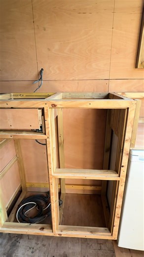 Luton van build - Kitchen units Building upon the structure of the shower, I secured The first section of the kitchen, beneath the sliding window. It is anchored to the shower, walls, and floor, providing plenty of strength while allowing me to determine the correct height & width for the kitchen worktop to meet my needs. After constructing the trap door beneath the sink unit, it was time to complete the remainder. This unit offers lots of space allowing me to create 5 drawers and 7 cabinets. Th
