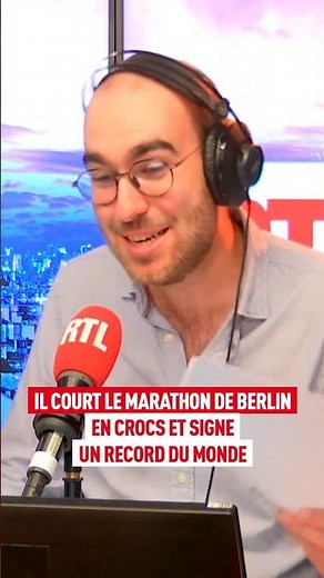 He runs the Berlin Marathon in Crocs and sets a world record