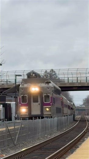 MBTA Inbound departs Fairmount station with a Geo car.
