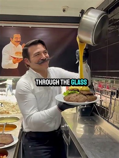 Man Feeds a Hungry Cat at Restaurant 🍽️🐱