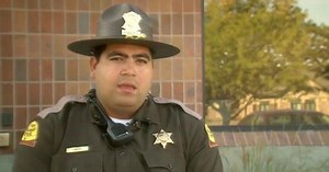 State trooper pulls man from car seconds before it was hit by train