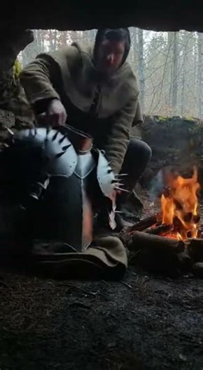 Man Calmly Puts On Spiked Steel Armor by Campfire | Ultra-Real Documentary Clip