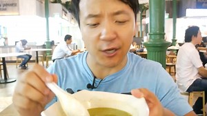 The bold Singapore flavors behind satay skewers and grilled stingray