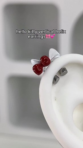 Just too cute😍 #hellokitty #hellokittyearrings #hellokittylover #hellokittyjewelry #earrings #jewelry #piercing #verticalhelix #verticalhelixpiercing #verticalhelixearrings #verticalhelixjewelry | Rera