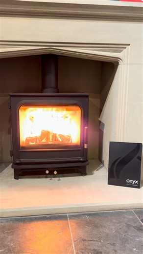  Another new live display alert  We’re excited to showcase the new Stovax Athos 5 Wide wood burning stove now on live display at our Cheshire Oaks showroom. With its sleek, contemporary design and impressive flame picture, the Athos 5 Wide is a perfect blend of style and performance. Visit us in-store to see it burning live and experience the warmth for yourself alongside plenty of other wood burning and multi-fuel stoves. | Amberglow Fireplaces Ltd | Facebook
