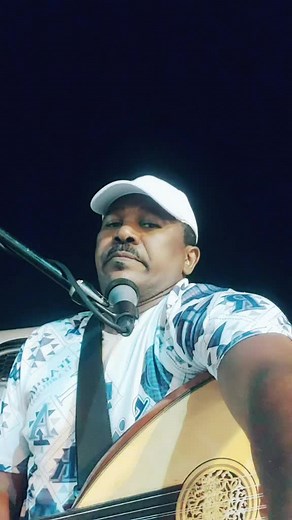 Captivating Oud Performance in Low-Light Setting