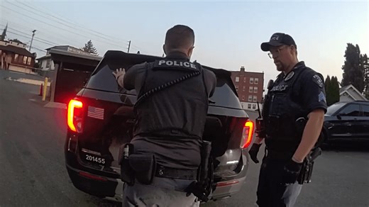 Video shows accused police impersonator tell Seattle firefighters to get away from body