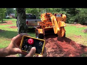 Old Style -7500 Series Tow-Behind Stump Cutter In-Action | J.P. Carlton