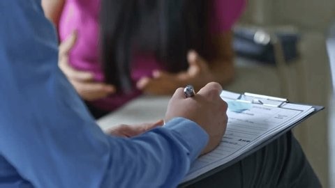 clip-3973285485-pan-shot-unrecognizable-male-hr-manager-writing